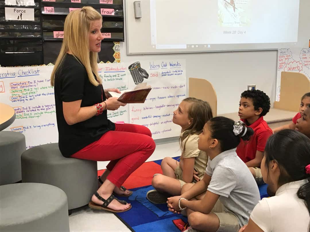 Second grade teacher Erin Brennan setting up a writing assignment as part of the ELA block.